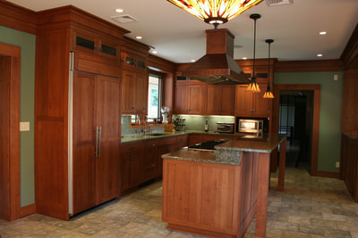 traditional kitchen cabinetry with shaker style doors in cherry 