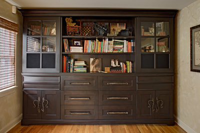 custom built-in cabinet with large handles
