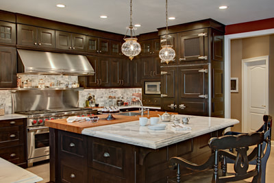 dark cabinetry with marble island, custom kitchen cabinets in new york
