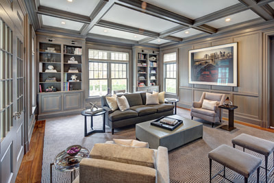 built-in bookcases and coffer ceilings
