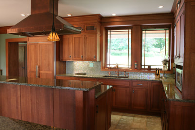 arts and crafts kitchen cabinetry with custom millwork